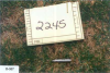 Item #2245: “One fired FC 223 REM caliber cartridge case”